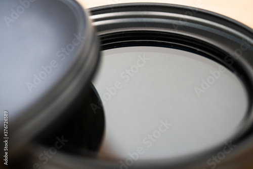 Fotografie Polarizing filter for reflex camera lens in its case