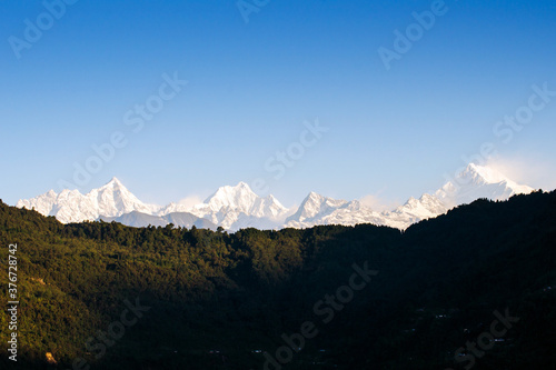 Mount Kanchenjunga range of the himalayas at first light of sunrise at Sikkim   India
