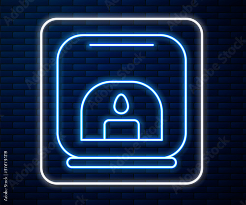 Glowing neon line Aroma lamp icon isolated on brick wall background. Vector Illustration.