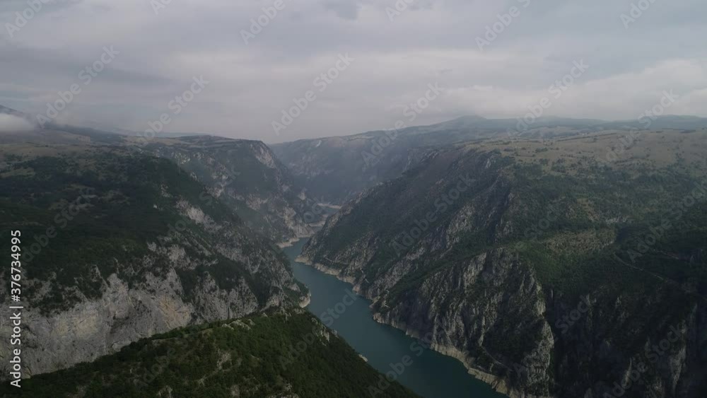 Mountains in Montenegro. Green forest in the hills. Beautiful landscape. Piva Canyon, Pluzine. Drone video. Beautiful water. Turquoise water. Summer. Fog. higher than clouds
Mountains in Montenegro. Green forest in the hills. Beautiful landscape. Piva Canyon, Pluzine. Drone video. Beautiful water. Turquoise water. Summer. Fog. higher than clouds