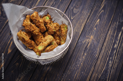 Fried chicken or vegan naggets on rustic background. Tasty snacks. Food recipes photo