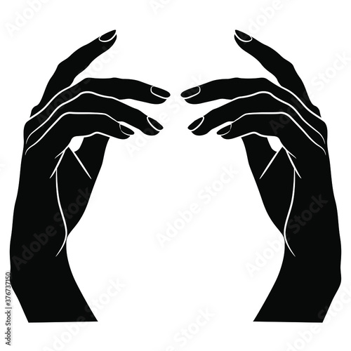 Two beautiful raised up female hands in elegant gesture. Black and white  silhouette.