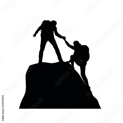 Silhouettes Of Climbers Helping Each Other