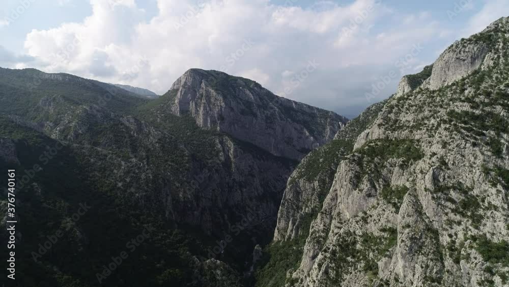 Mountains in Montenegro. Green forest in the hills. Beautiful landscape. Drone video. Rocky Mountains. Mountains in Montenegro. Green forest in the hills. Beautiful landscape. Drone video. Rocky Mountains.