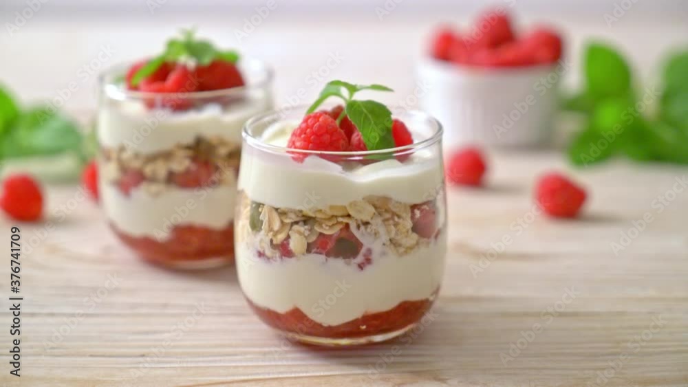 fresh raspberry and yogurt with granola - Healthy food style fresh raspberry and yogurt with granola - Healthy food style