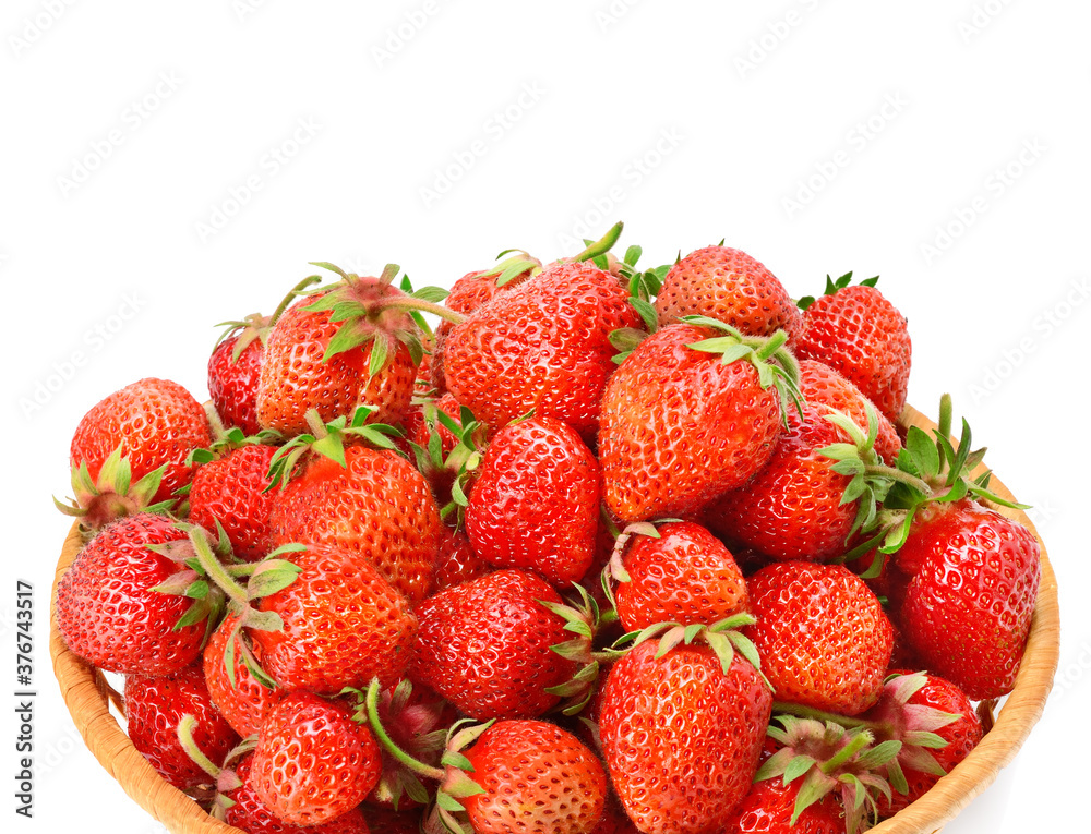 Appetizing strawberry in a basket isolated on a white . Appetizing strawberry in a basket isolated on a white .