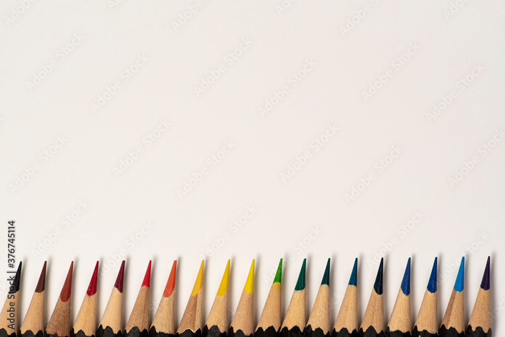 Fototapeta premium Colour pencils isolated on white background. Macro