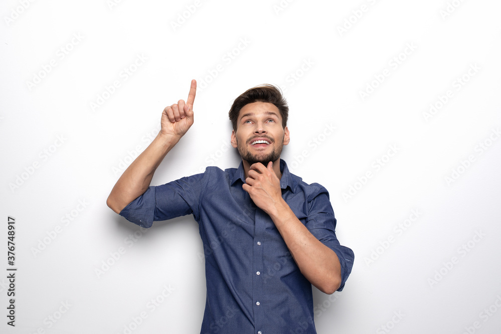Happy handsome man over blue background Happy handsome man over blue background