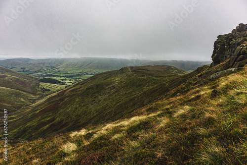 Fotografie Mountain and valley in a foggy weather