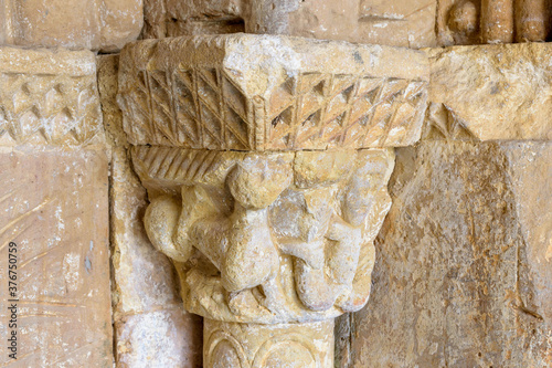 Romanesque capitals of the door of the Hoyos del Tozo church, in Burgos, Castilla y Leon, Spain photo