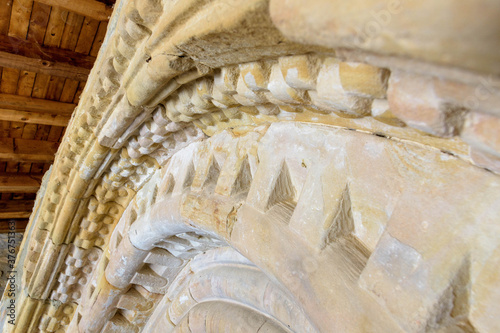 Door of the Hoyos del Tozo church, with Romanesque elements, in Burgos, Castilla y Leon, Spain photo