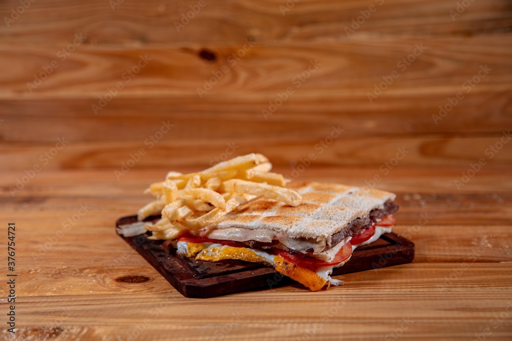 Meat sandwich with wood backgound Meat sandwich with wood backgound