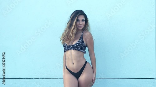 Hispanic Bikini girl at the beach - Gerneration Z lifestyle photo