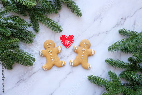 gingerbread man, heart and fir tree. Christmas and New Year holiday background. winter season. flat lay