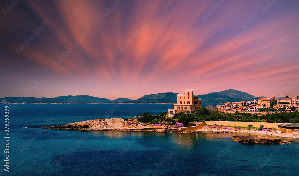 Landscape of the city of Alghero - Sardinia in a dramatic summer sunset