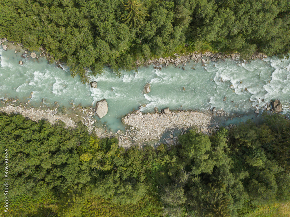 Εκτύπωση καμβά Aerial view of whitewater rapids in river in Swiss alps
