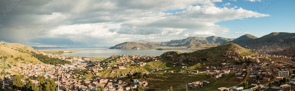 Panoramic view of Puno city and Lake Titicaca, Peru, South America Panoramic view of Puno city and Lake Titicaca, Peru, South America