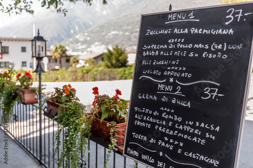 Restaurant menu on blackboard, Bellinzona, Ticino, Switzerland photo