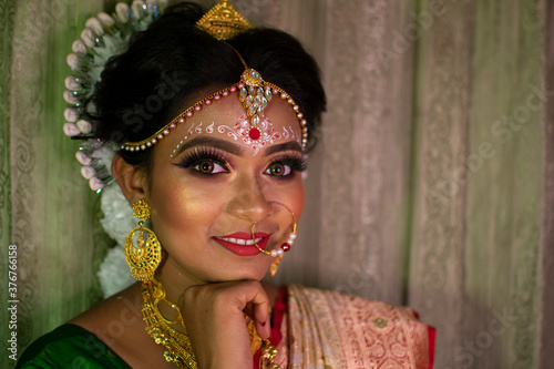 an indian woman with bridal makeup © Pabitra