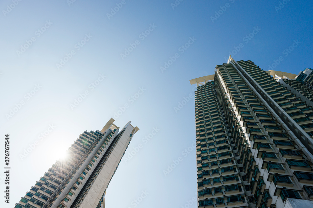 Modern architecture in Tung Chung, low angle view, Lantau Island, Hong Kong, China Modern architecture in Tung Chung, low angle view, Lantau Island, Hong Kong, China