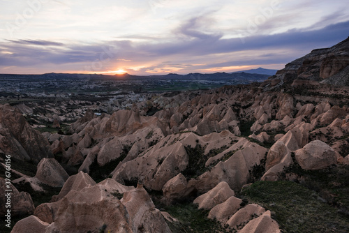 View from Aktepe Hill at sunset over Red Valley, Goreme National Park, Cappadocia, Anatolia, Turkey photo