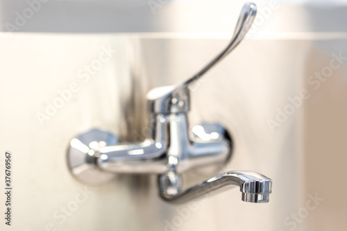 Washbasin tap for medical workers close up