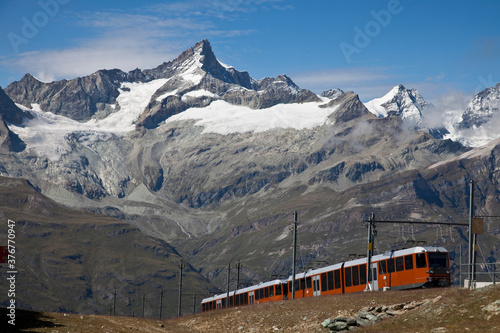 Glacier Express panoramic train, Swiss Alps, Zermaat, Switzerland photo