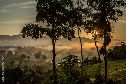 Sunrise over Myanmar and Las and Ruak river, Golden Triangle, Chiang Rai, Thailand photo