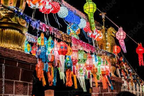 Rows of colourful paper lanterns at night, Paper Lantern Festival - Loy Krathong, Chiang Mai, Thailand