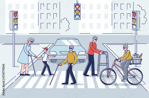 Senior men and women walking in city. Older people group crossing street holding sticks