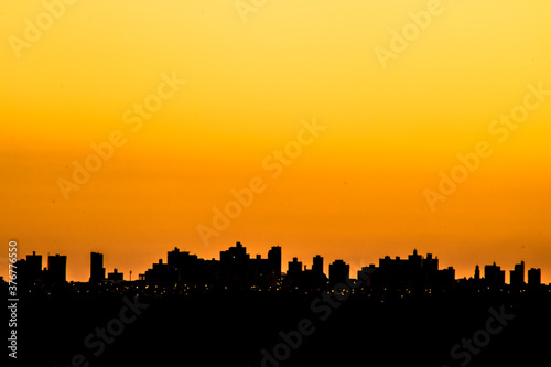 Silhouette of cityscaper buildings during a sunset in Brazil