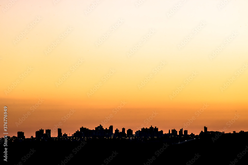 Silhouette of cityscaper buildings during a sunset in Brazil