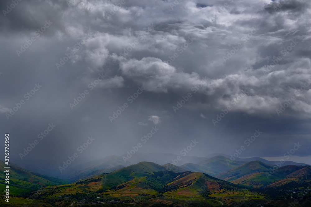 Rainstorm Over Mountains Hills in Springtime Spring Rains