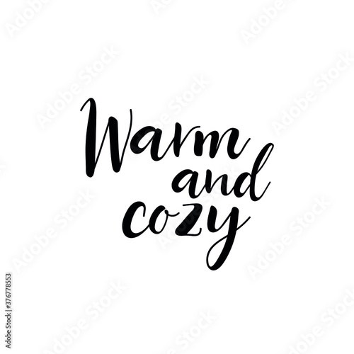 Warm and cozy. Vector illustration. Christmas lettering. Ink illustration. t-shirt design.