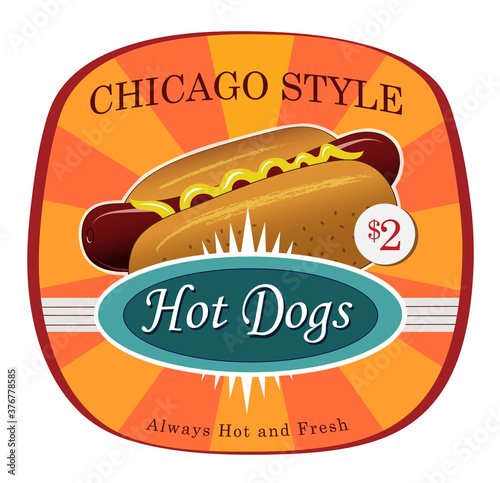 Hot dog with mustard on a bun.