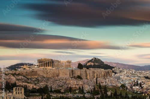 Acropolis of Athens against cloudy sky
