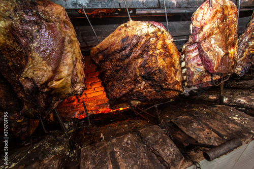 Photography Brazilian style beef ribs Barbecue grill on skewers  at a churrascaria steakhouse in Brazil