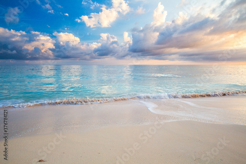 White sand beach during sunrise