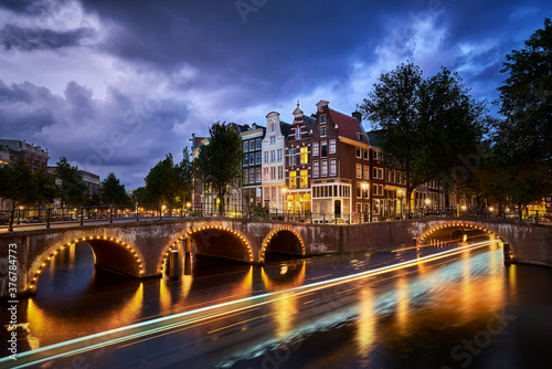 View of Keizersgracht and Leidsegracht canal at dusk photo