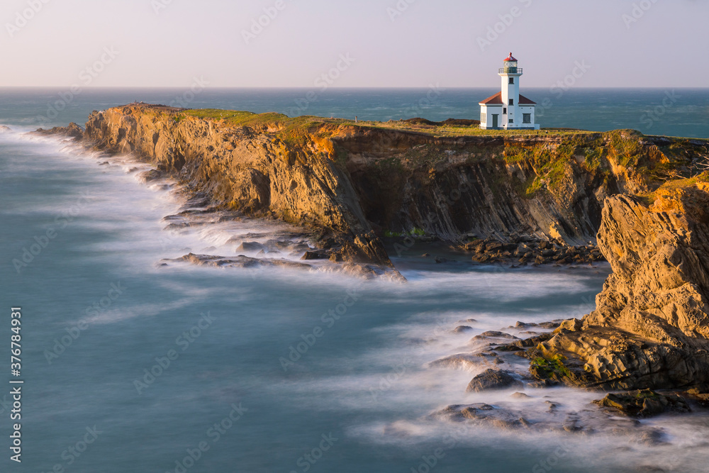 View of Cape Arago Lighthouse during sunset View of Cape Arago Lighthouse during sunset