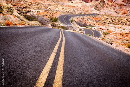 View of road passing through desert landscape photo