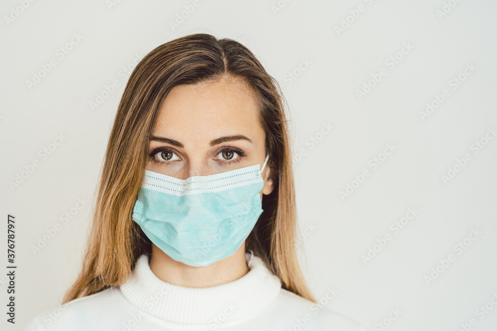 Woman with corona mask protecting her from Covid-19 Woman with corona mask protecting her from Covid-19