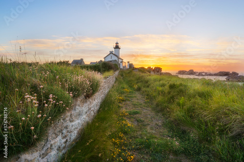 View of Phare de Pontusval during sunset photo