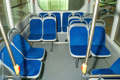 Empty bus interior. Blue se...