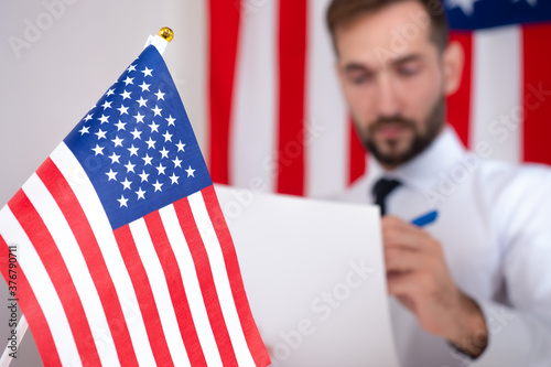 An American official reads ...