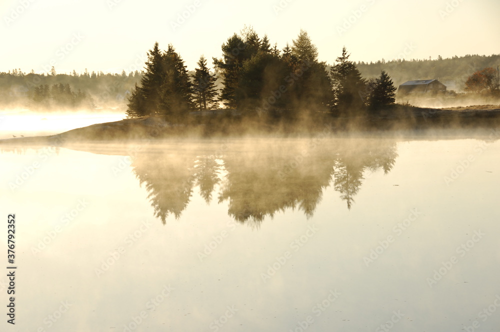 Scenic view of lake during sunrise Scenic view of lake during sunrise