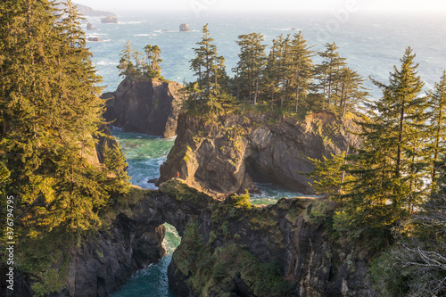 View of rock formations in Samuel H. Boardman State Scenic Corridor during sunset photo