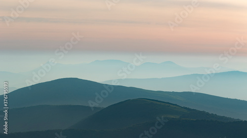 Scenic view of mountains during sunrise