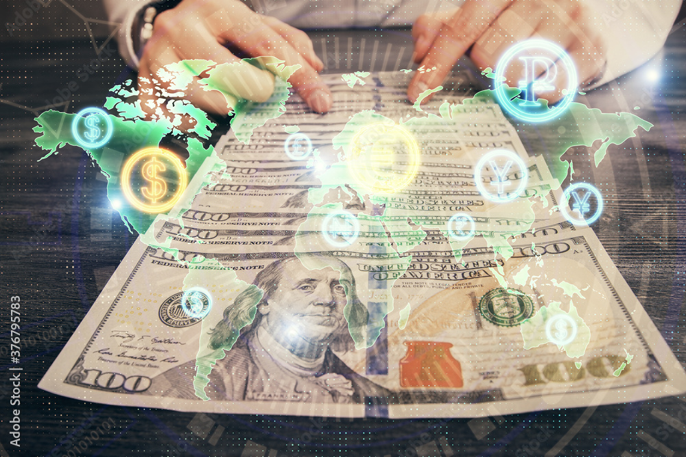 Multi exposure of forex graph drawing hologram and USA dollars bills and man hands. Technical Analysis concept. Multi exposure of forex graph drawing hologram and USA dollars bills and man hands. Technical Analysis concept.