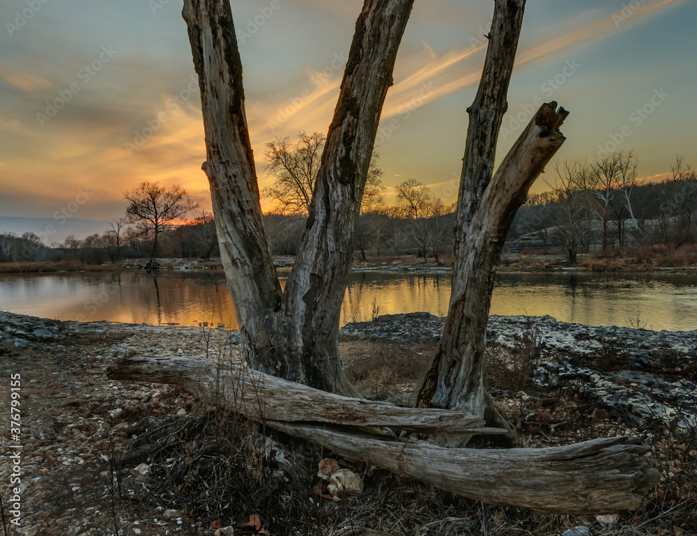 Neosho River and silhouetted trees at day's end.  Northeastern Oklahoma